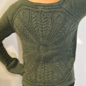 Hunter green bell sleeved sweater with crochet detail on back